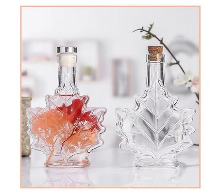 Bottiglia per bevande in vetro industriale a colori personalizzati a forma di foglia di acero 50 ml 100 ml 250 ml
