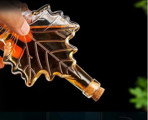 Bottiglia per bevande in vetro industriale a colori personalizzati a forma di foglia di acero 50 ml 100 ml 250 ml