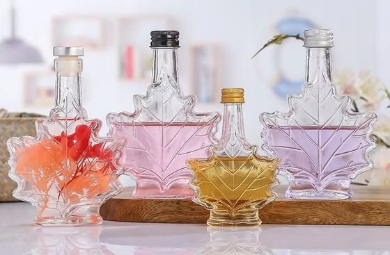 Bottiglia per bevande in vetro industriale a colori personalizzati a forma di foglia di acero 50 ml 100 ml 250 ml