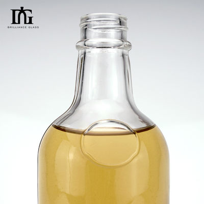 Acceptabile OEM/ODM 550ml Bottiglia a cappuccio a vite trasparente per bottiglia di vetro alcolico di vino e gin rum