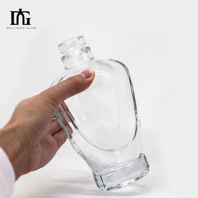 Logo del cliente accettabile Bottiglia di liquore in vetro da 750 ml per vodka rotonda chiara su misura