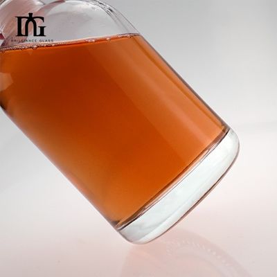 Bottiglia di liquore di vino di frutta di vetro trasparente da 500 ml con superficie incisa in sughero