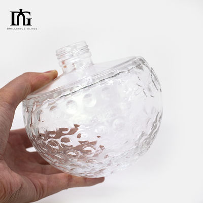 Bottiglia di vetro trasparente da 700 ml con forma di teschio unica e sughero inciso