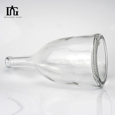 Bottiglia di vetro trasparente da 650 ml con coperchio fornito liberamente e sigillo rotondo appiattito