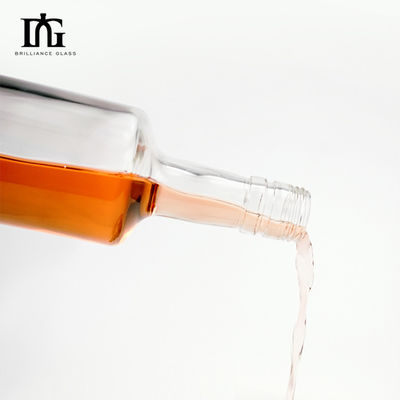 Bottiglia di 750 ml di vetro vuota, chiara e rotonda per vodka, liquori, tequila e mezcal